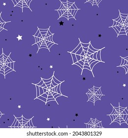 Seamless halloween pattern. white cobwebs and stars on a purple background. vector texture. fashionable print for textiles, wallpapers and postcards.