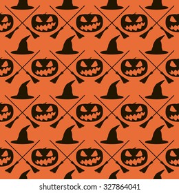 Seamless Halloween pattern of witch hats, crossed broomsticks and wickedly grinning evil pumpkins. Eerie background in black and orange colors. Vector illustration