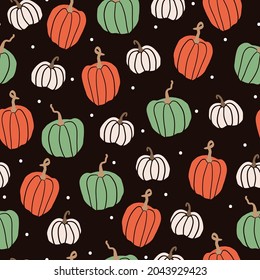 Seamless halloween pattern. wonderful colored pumpkins and white dots on a dark brown background. vector texture. fashionable print for textiles, wallpaper and packaging.