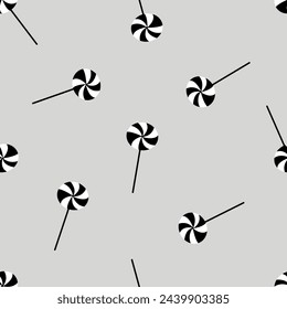 Seamless Halloween vector pattern. Fashionable lollipop pattern for wrapping paper, wallpaper, stickers, notepad cover.
