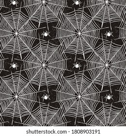 Seamless halloween vector pattern. Hand-drawn spiders and spider webs. White outlines on a black background. Scary and creepy illustration