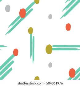 Seamless hand draw brush and spot pattern in green yellow orange and grey.