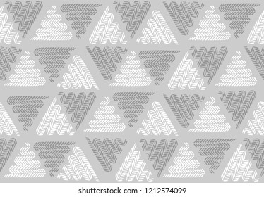 Seamless hand drawing with white and dark gray lace triangles on gray background
