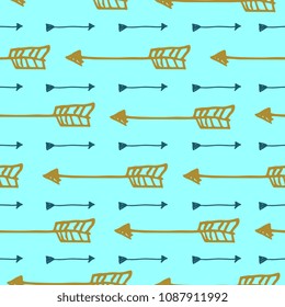 seamless hand drawn arrow bohemian fashion style. Blue and gold colorful pattern.