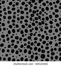 Seamless hand drawn black dots pattern