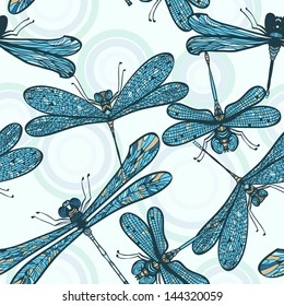 Seamless hand drawn blue vintage pattern with dragonflies