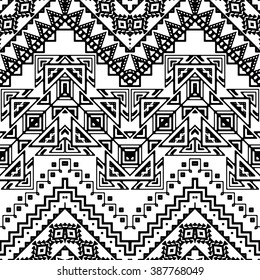 Seamless hand drawn chevron pattern with aztec ethnic and tribal ornaments. Vector black and white boho fashion illustration