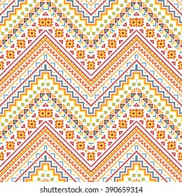 Seamless hand drawn chevron pattern with Aztec ethnic and tribal ornament. Vector bright colors boho fashion illustration.