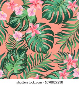	
Seamless hand drawn exotic vector pattern with green palm leaves and hibiscus flower.