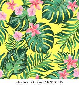 	
Seamless hand drawn exotic vector pattern with green palm leaves and hibiscus flower.
