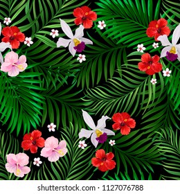 Seamless hand drawn exotic vector pattern with green palm leaves and hibiscus flower.