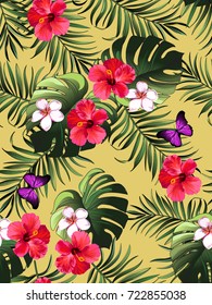 Seamless hand drawn  exotic vector pattern with green palm leaves and hibiscus flower.