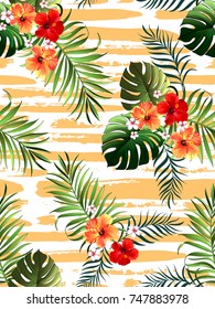 Seamless hand drawn exotic vector pattern with green palm leaves and hibiscus flower.