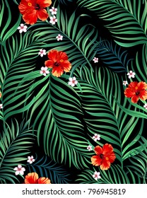 Seamless hand drawn exotic vector pattern with green palm leaves and hibiscus flower.