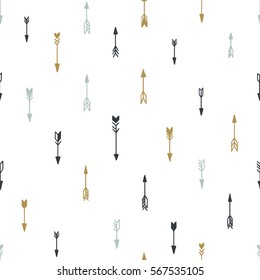 Seamless hand drawn geometric tribal pattern with arrows. Vector navajo design.