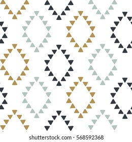 Seamless hand drawn geometric tribal pattern with rhombuses and triangles. Vector navajo design.