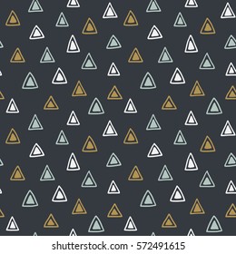 Seamless hand drawn geometric tribal pattern with triangles. Vector navajo design.