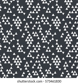 Seamless hand drawn geometric tribal pattern with triangles. Vector navajo design.