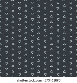 Seamless hand drawn geometric tribal pattern with triangles. Vector navajo design.