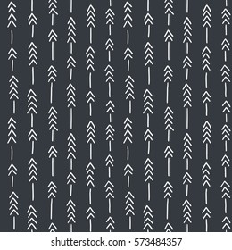 Seamless hand drawn geometric tribal pattern with arrows. Vector navajo design.