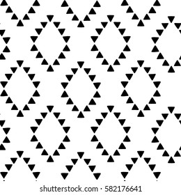 Seamless hand drawn geometric tribal pattern with rhombuses and triangles. Vector navajo design.