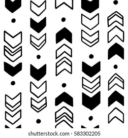 Seamless hand drawn geometric tribal pattern. Vector navajo design.