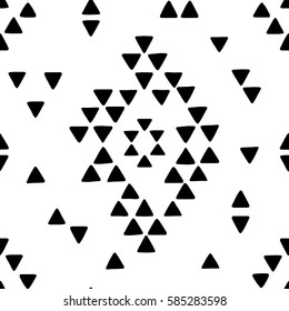 Seamless hand drawn geometric tribal pattern with rhombuses and triangles. Vector navajo design.