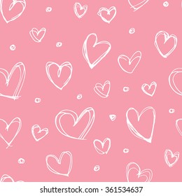 Seamless hand drawn heart pattern. Valentine's Day pattern. Scribble hearts on a pink background