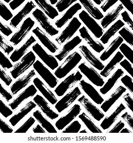Seamless hand drawn herringbone pattern. Ink vector illustration. Herringbone textured seamless pattern. Geometric brush ornament. Hand drawn brush strokes background. Modern texture with chevron