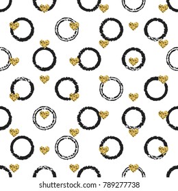 Seamless hand drawn ink polka dot pattern with gold heart shapes. Ink illustration. Brush circle background. Valentines day. Memphis style.