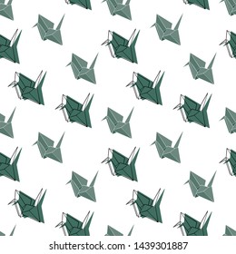 Seamless hand drawn origami vector pattern. Green paper figures of crane isolated on white background. Black contoured elements. Paper folding illustration. Perfect for wallpaper or fabric.