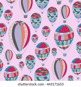 Seamless hand drawn pattern with aerostat elements. Ornamental  colorful air balloon design. Bright colors. 