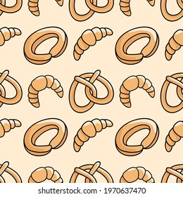 Seamless hand drawn pattern with croissant and bagel on orange background. The template for bakery prints. Food background. Textile. Scrapbooking. Wallpaper. For print.