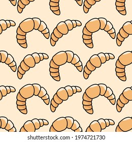 Seamless hand drawn pattern with croissant and bagel on orange background. The template for bakery prints. Food background. Textile. Scrapbooking. Wallpaper. For print.