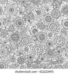 Seamless hand drawn pattern with flowers. Ornate pattern with abstract flowers and leaves. Doodle floral background. Zentangle inspired pattern. Black and white pattern for your business. 