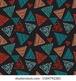 Seamless hand drawn pattern with geometric triangle abstract. Colorful vintage trendy vector illustration for fashion textile wrapping and print.