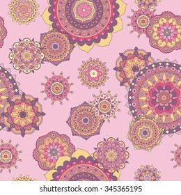 Seamless hand drawn pattern with mandala