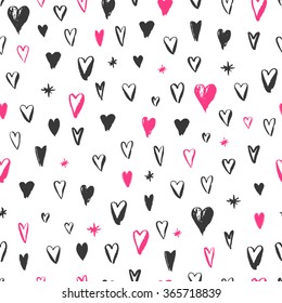 Seamless hand drawn pattern. Valentine's day theme. Vector background with hearts.