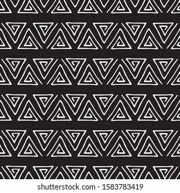 Seamless hand drawn pattern, vector illustration. Abstract geometric vector pattern with triangles.
