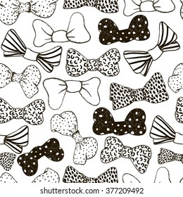 Seamless hand drawn pattern of vintage bow ties. Vector black ties on white background. Retro line drawn texture. Monochrome background