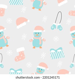 Seamless hand drawn pattern of winter elements on a grey background. Surface design for textile, fabric, wallpaper, packaging, gift wrap, paper, scrapbook and packaging