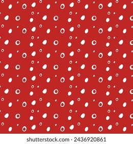 Seamless hand drawn polka dot pattern. Random dots, round elements, ovals, animal skin. Irregular abstract vector texture.