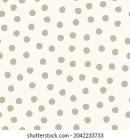 Seamless hand drawn polka-dot pattern on white background for surface design and other design projects