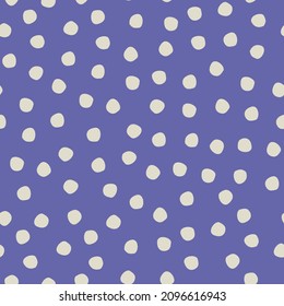 Seamless hand drawn rustic polka-dot pattern on Colors, Pantone of the 2022 year Very Peri background for surface design and other design projects