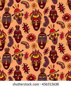 Seamless hand drawn scary african masks pattern