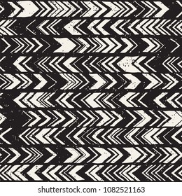 Seamless hand drawn style chevron pattern in black and white. Abstract vector grungy background