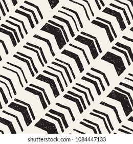 Seamless hand drawn style chevron pattern in black and white. Abstract vector grungy background