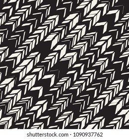 Seamless hand drawn style chevron pattern in black and white. Abstract vector grungy background