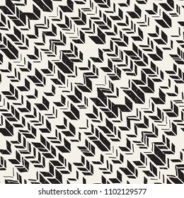 Seamless hand drawn style chevron pattern in black and white. Abstract vector grungy background