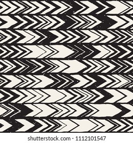 Seamless hand drawn style chevron pattern in black and white. Abstract vector grungy background